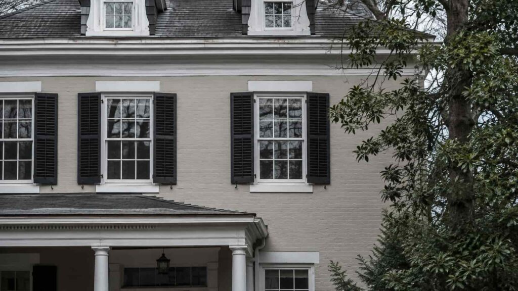 Older Montgomery County home facade with single-pane wood sash windows